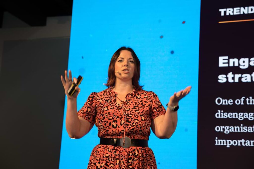 Jenni Field, author of Influential Internal Communication, speaking at VOICES London 2022.