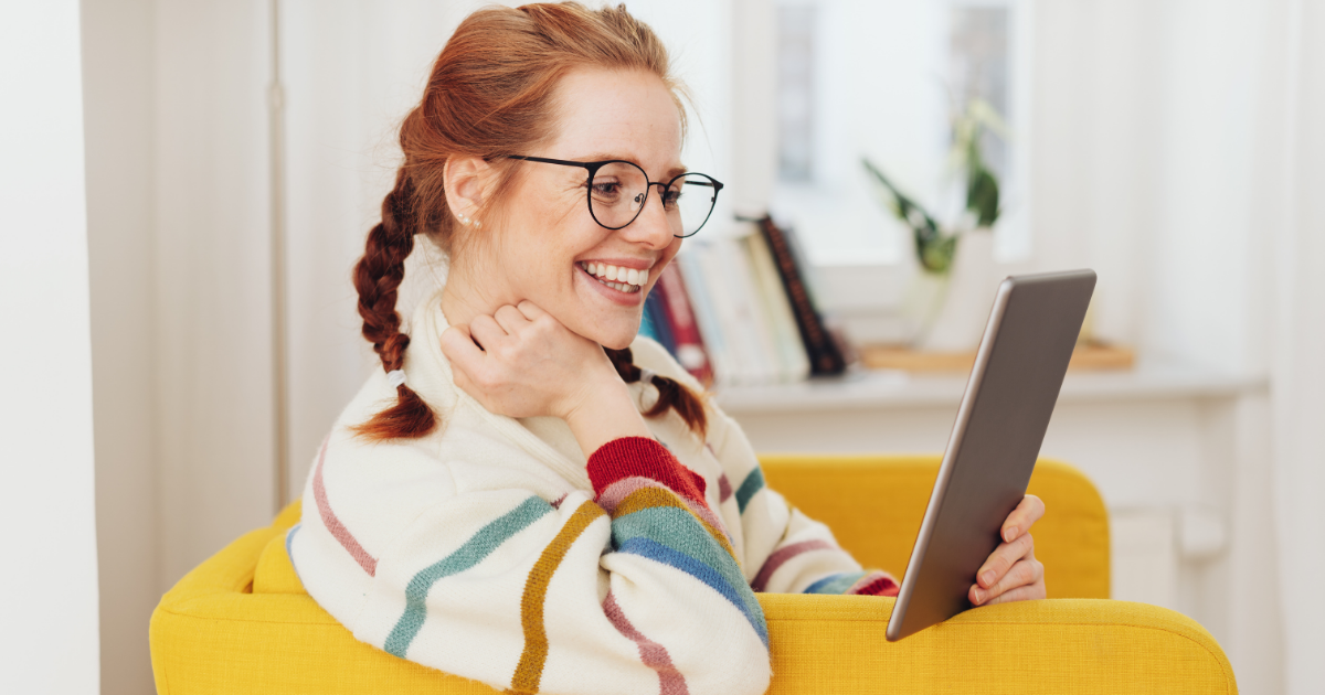 employee newsletter names image featuring a woman on a deviceemployee newsletter names image featuring a woman on a device