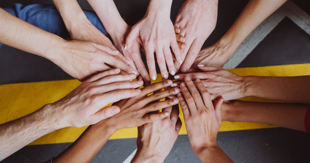 Employee relations embodied by hands together in unison