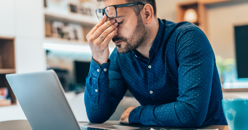 communication tool image showing disengaged worker on a laptop