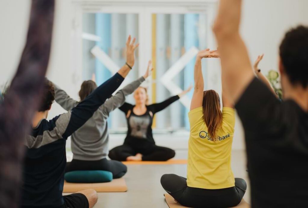 Team Doing Yoga Office Fitness With Staffbase Merch T Shirt