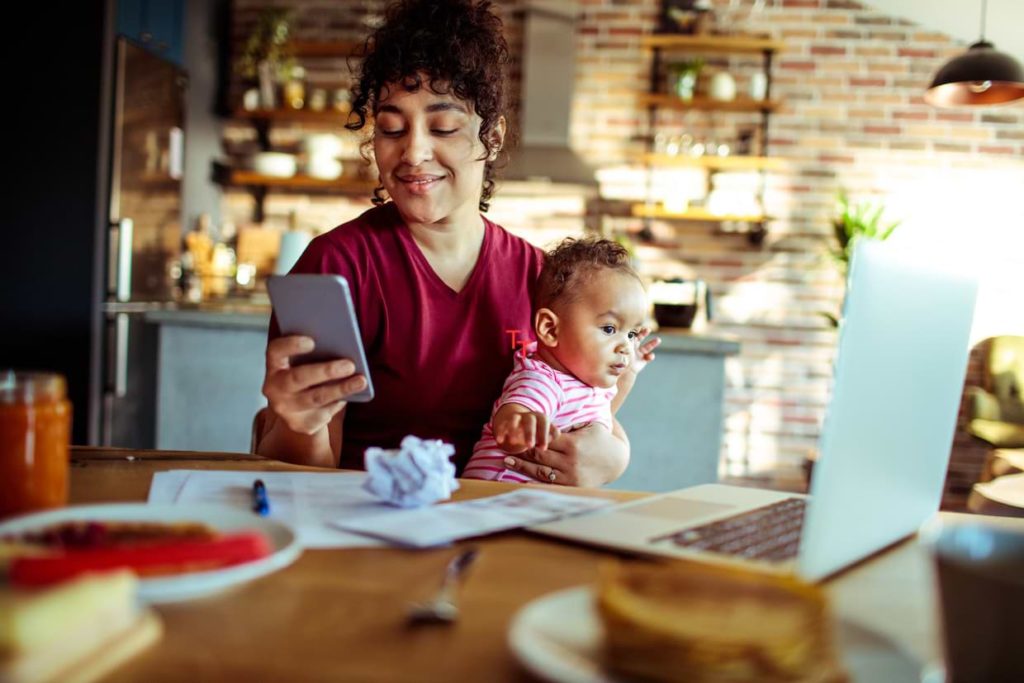 A picture of a woman working at home.